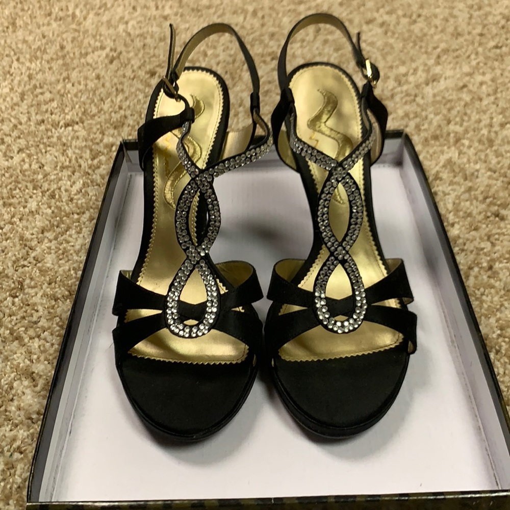 Black heels w/ rhinestones straps. Size 8 1/2